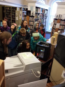 A fifth grade class from Boscobel Elementary School is wowed by the Makerbot Mini 3-D printer